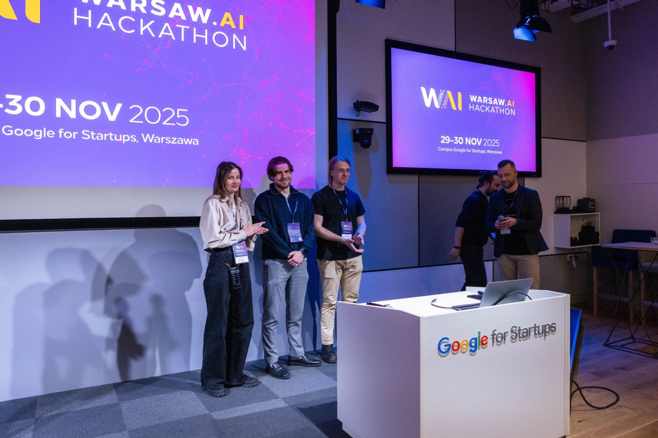 Warsaw.AI Hackathon finalists on stage