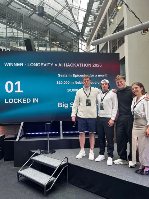 Team LockedIn on stage after winning the Stockholm Longevity × AI Hackathon